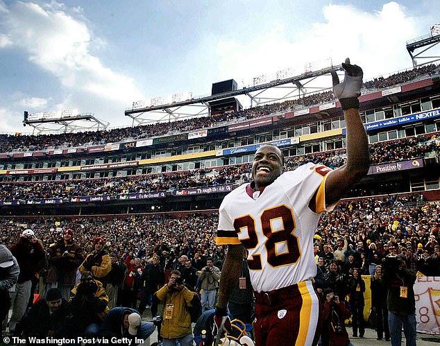Darrell Green celebrates during his Washington playing days; he retired in 2002 after 20 NFL seasons.
