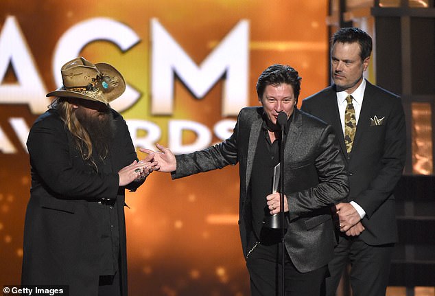 Ronnie Bowman speaks as he, Chris Stapleton, and Barry Bales accept Song of the Year for Nobody to Blame at the 2016 ACM Awards