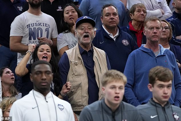Bill Murray smiles and applauds courtside as UConn clinches a Sweet 16 berth in Philadelphia