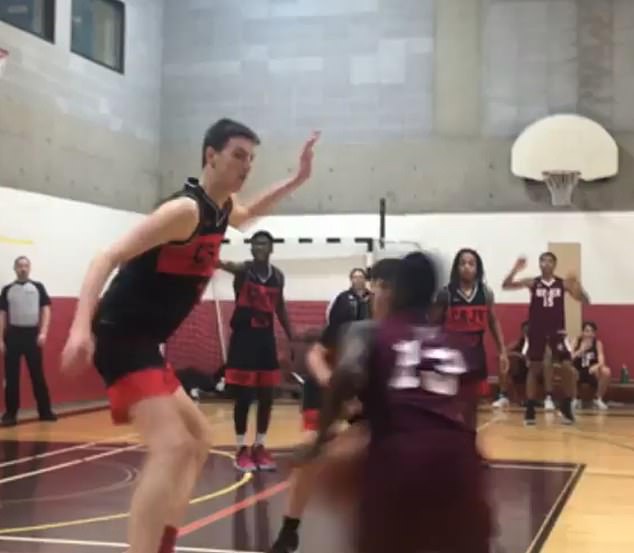 High-school footage shows Olivier Rioux towering over opponents near the rim.