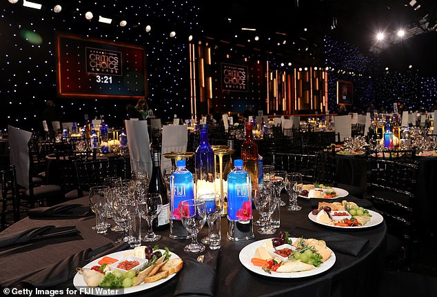 Critics Choice Awards-style banquet tables and plated meals, referenced amid awards-show food backlash.