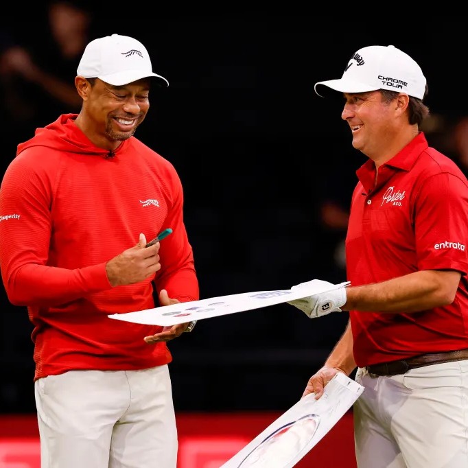 Kisner said of Woods, "He was trying to do anything he could to come back and help our TGL team, get ready, hopefully try and play the Masters." The two are seen here signing autographs together earlier this month. - Getty Images