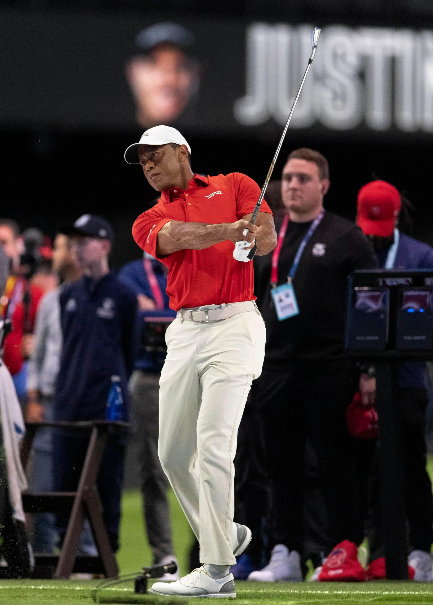 Tiger Woods warms up before a TGL match in March 2026.