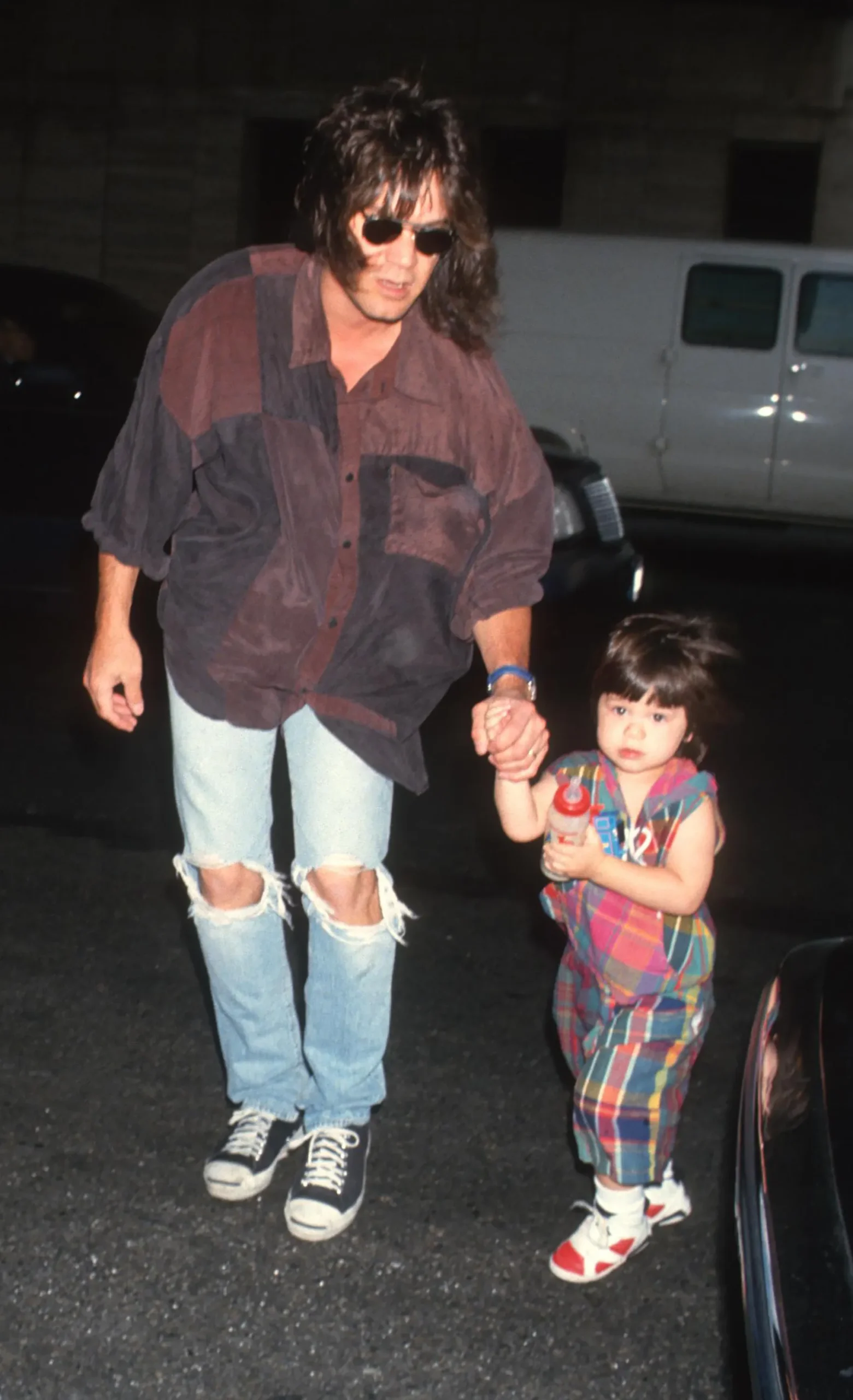 Eddie Van Halen with his son, Wolfgang Van Halen, in 1993.