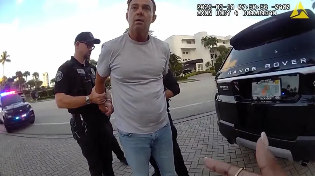 Petrus Viljoen is pulled over and detained beside a black Range Rover during the Boca Raton traffic stop.