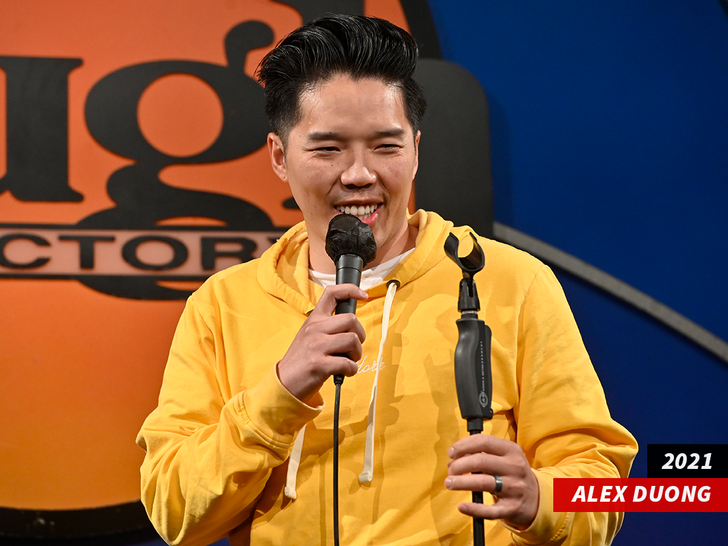 Alex Duong performing during a stand-up set