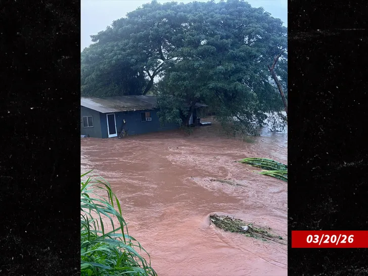 Floodwater surrounds a Honolulu home during Oahu's heavy rains, as seen in a photo from the Honolulu Fire Department.