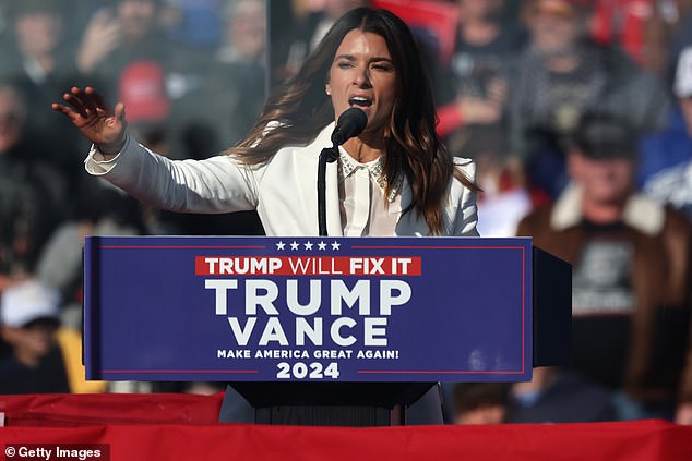 Danica Patrick speaks on stage at a political event