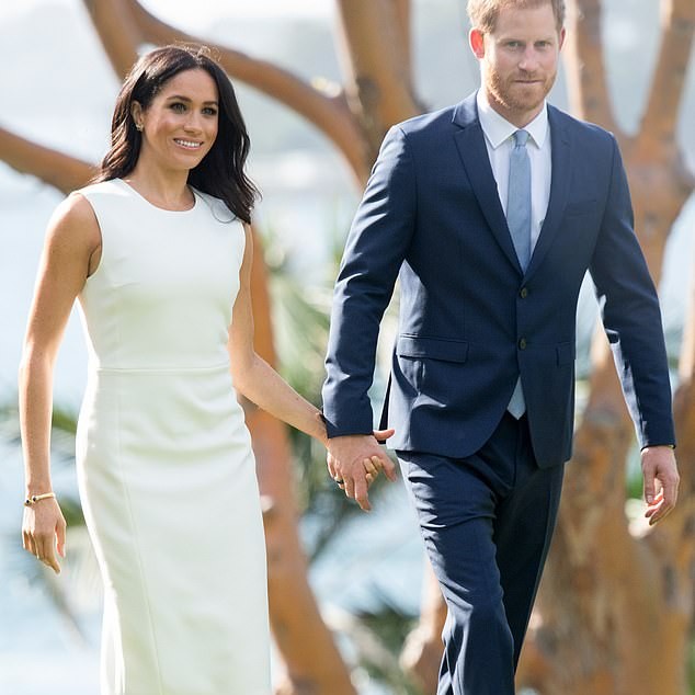 In 2018, having just announced she was pregnant with her first child, the Duchess had chosen the white sleeveless 'Blessed' dress from Karen Gee - Daily Mail