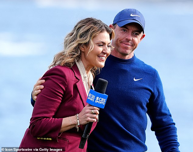 Rory McIlroy speaks with broadcaster Amanda Balionis during a post-round interview.