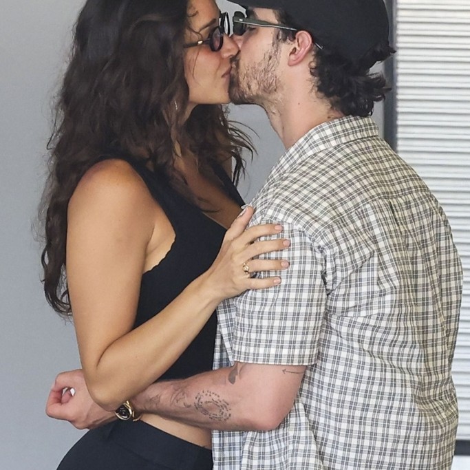 Joe Jonas and Tatiana Gabriela kissing at the airport. - MiamiPIXX/VAEM / BACKGRID