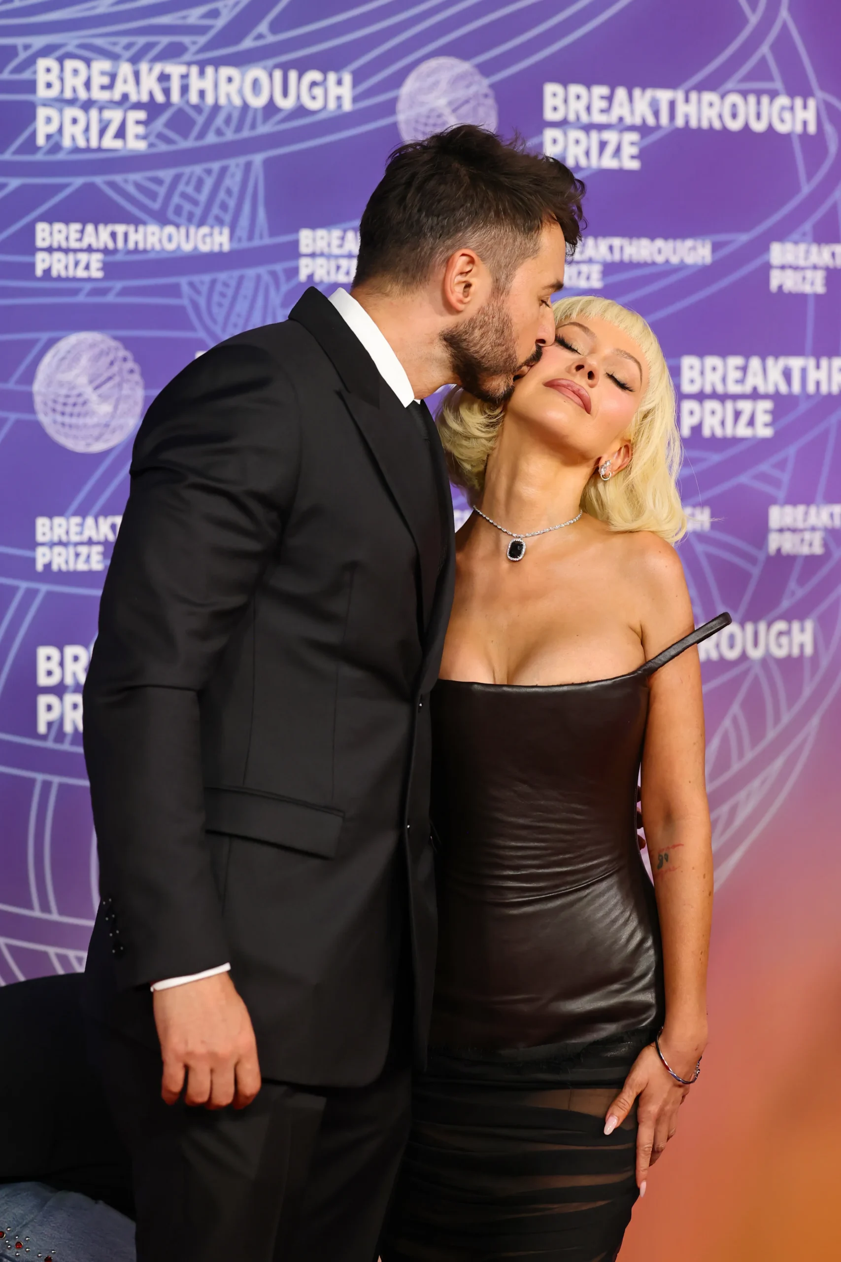 Christina Aguilera and fiance Matthew Rutler on the red carpet at the 2026 Breakthrough Prize Ceremony.