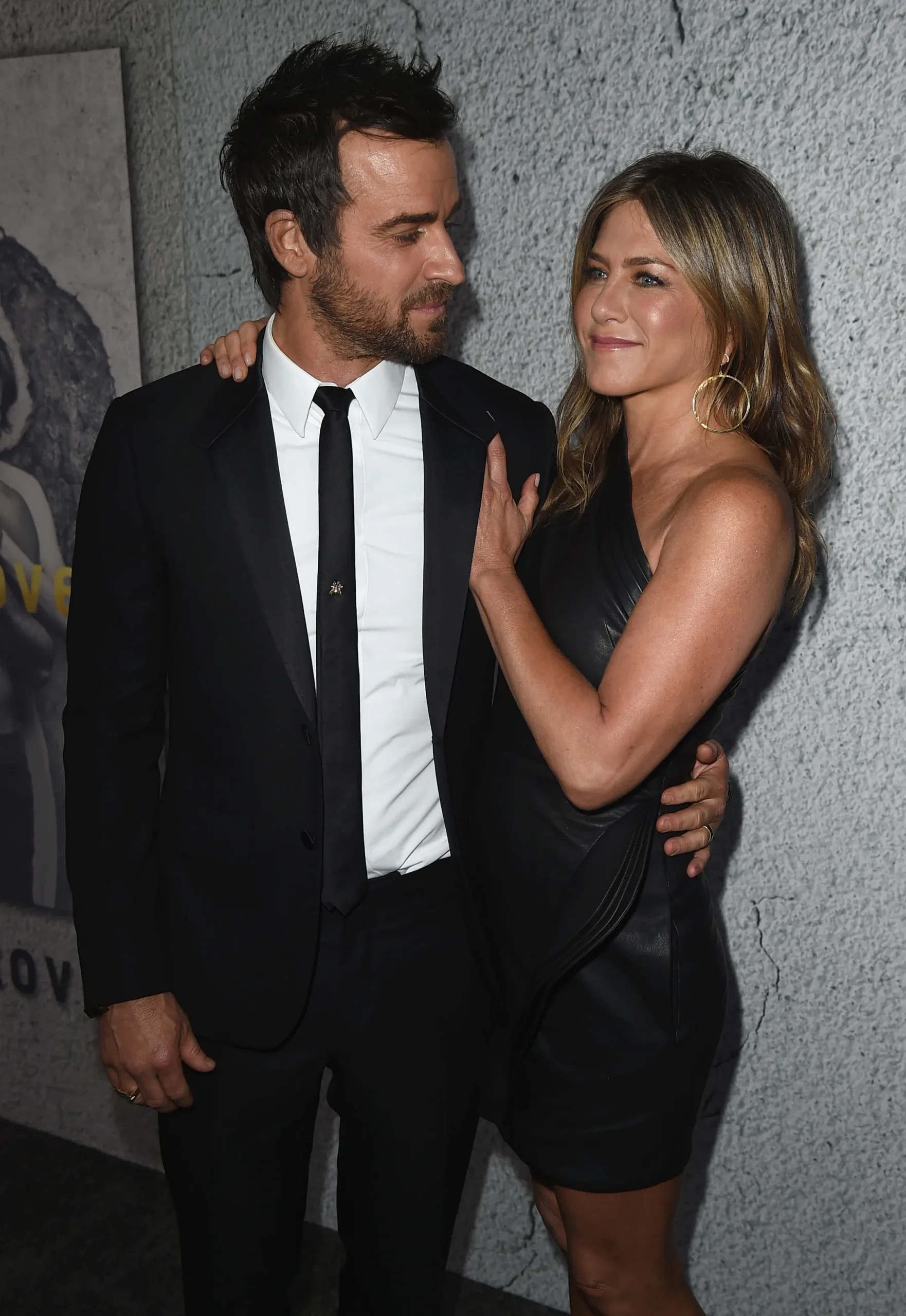 Jennifer Aniston and Justin Theroux posing together at a 2017 premiere.
