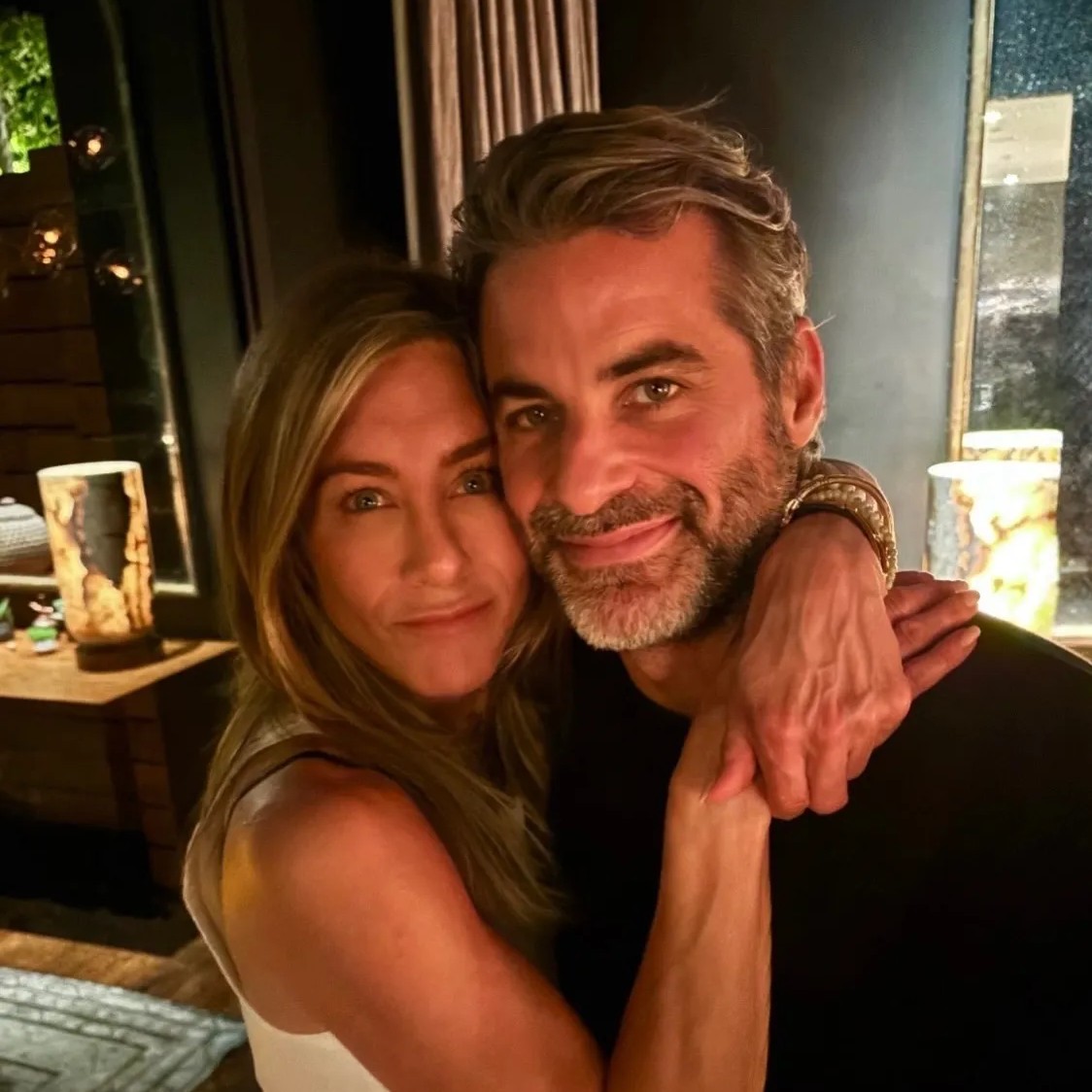 Aniston has since moved on with Jim Curtis (seen here). - jennifer aniston/ instagram