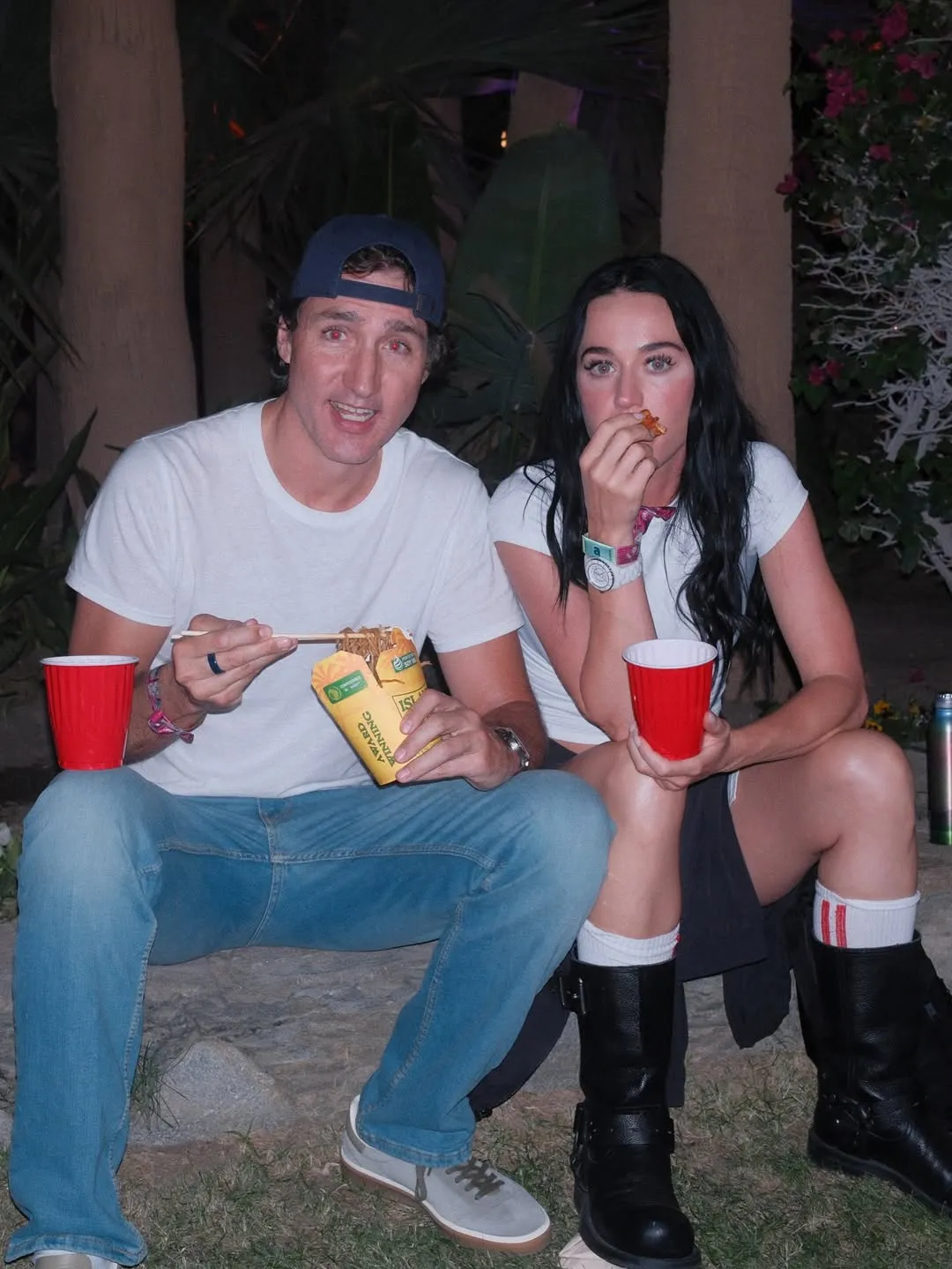 Katy Perry and Justin Trudeau walking hand-in-hand at Coachella.