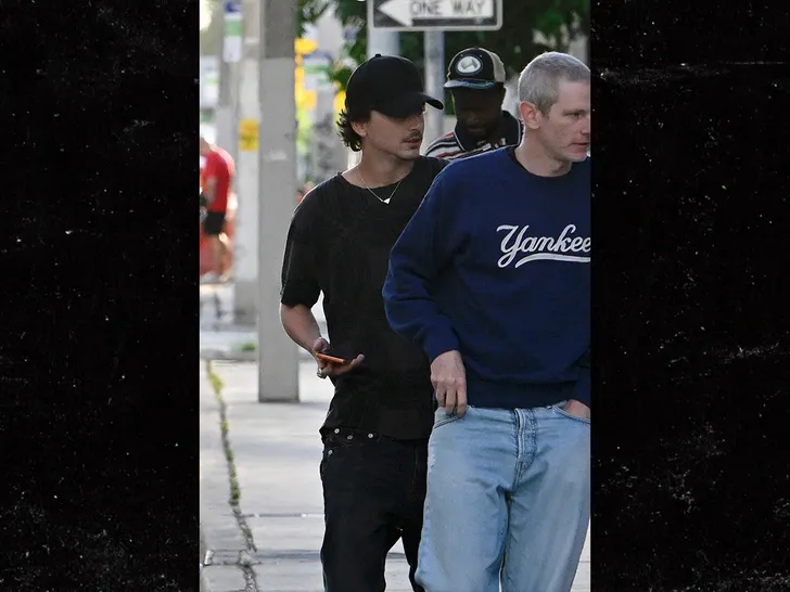 Chalamet walks into E11EVEN Miami with a small group during early evening. Backgrid.