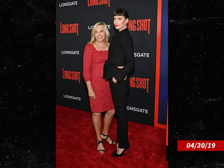 Charlize Theron and her mother, Gerda Maritz, on a red carpet