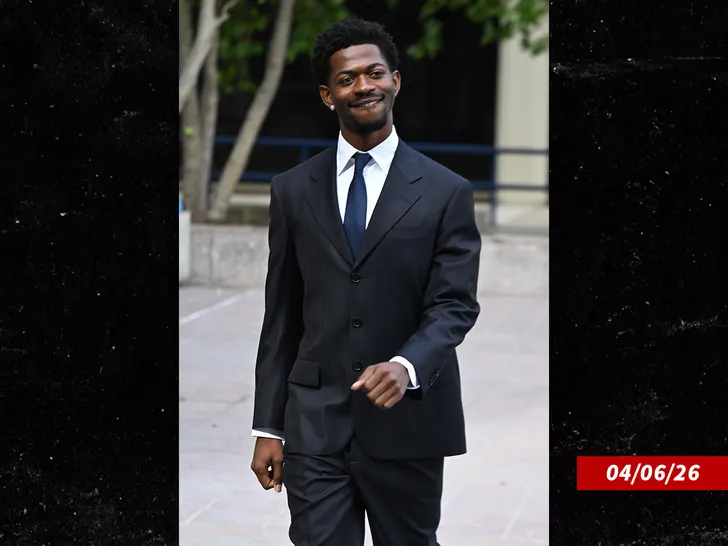 Lil Nas X walking toward the camera.